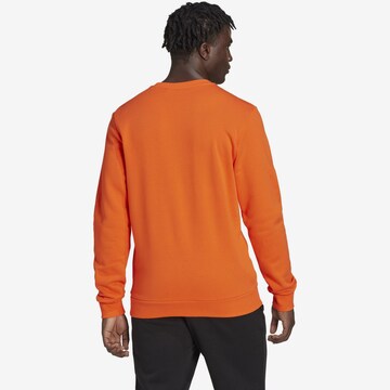 ADIDAS SPORTSWEAR Sportovní mikina 'Essentials' – oranžová