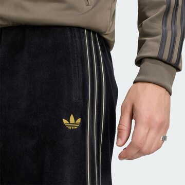 ADIDAS ORIGINALSregular Hlače 'Firebird' - crna boja