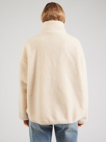 Giacca di pile di Monki in beige