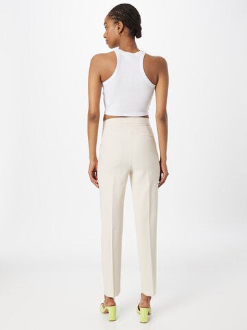 Gina Tricot Slim fit Trousers with creases 'Karin' in Beige