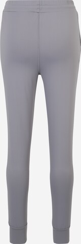 CURARE Yogawear Tapered Sporthose in Grau