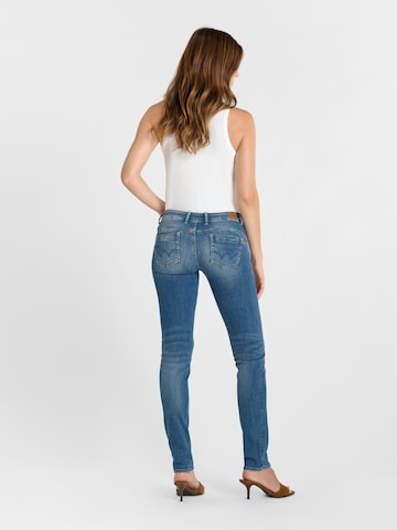 Coupe slim Jean Le Temps Des Cerises en bleu