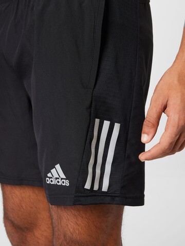 ADIDAS SPORTSWEAR Regular Workout Pants 'Own the Run' in Black