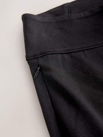 Skinny Leggings di Next in nero