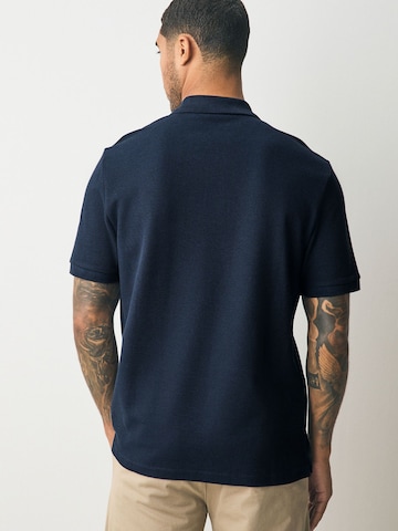 Tricou de la Next pe albastru