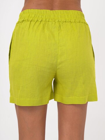 FRESHLIONS Regular Trousers in Green
