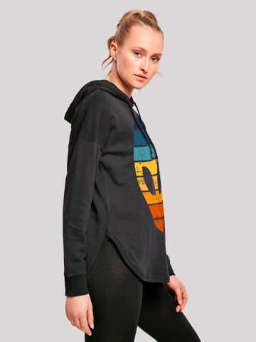 Sweat-shirt 'Alien Sonnenuntergang Retro' F4NT4STIC en noir