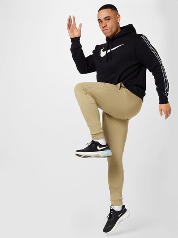 Nike Sportswear Bluzka sportowa 'Repeat' w kolorze czarny