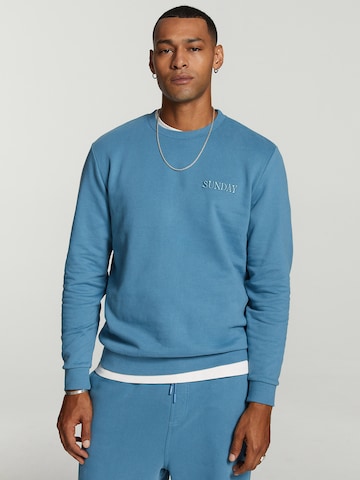 ShiwiSweater majica 'Sunday' - plava boja: prednji dio