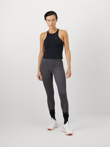 NIKE Top sportowy w kolorze czarny