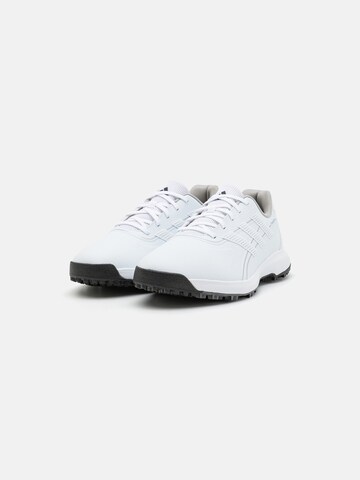 Chaussure de sport ADIDAS GOLF en blanc : devant