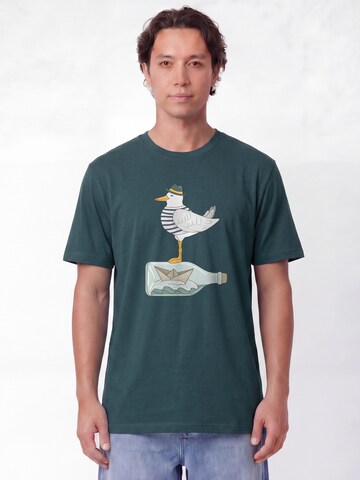 T-Shirt 'Möwe Mit Hut' Watapparel en vert : devant