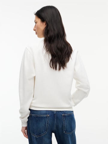 Tommy Jeans Collegepaita värissä valkoinen