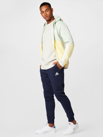 ADIDAS SPORTSWEAR - Tapered Pantalón deportivo 'Essentials' en azul