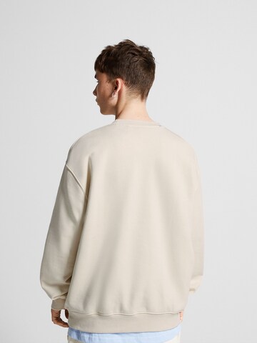 Sweat-shirt Bershka en blanc