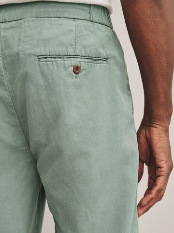 Next Обычный Брюки со складками в Зеленый