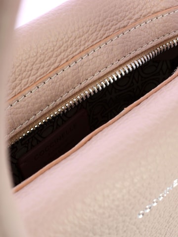 Coccinelle Handtas 'Coccinelle Lord leather crossbody bag' in Beige