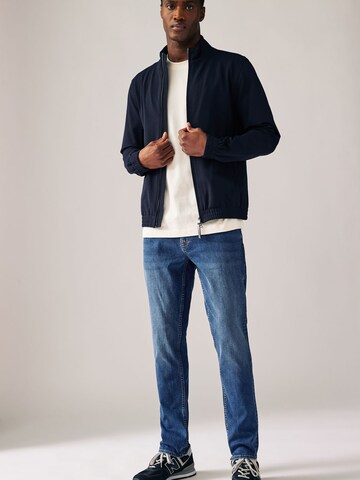 Next Skinny Jeans 'Essential' in Blue