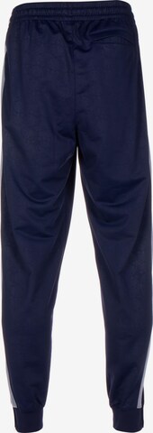 Tapered Pantaloni sportivi 'Giannis' di NIKE in blu