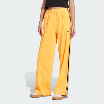 ADIDAS ORIGINALS Wide leg Broek 'Adicolor Classic Firebird' in Oranje: voorkant