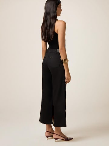 oltre Flared Trousers in Black