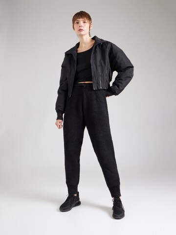 Nike Sportswear Tapered Trousers 'Phoenix' in Black