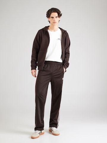 ADIDAS ORIGINALS Normalny krój Spodnie 'FIREBIRD' w kolorze brązowy