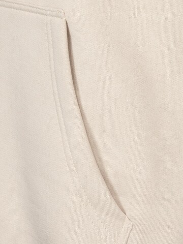 Koyumi Sweatshirt 'Free your Neck' in Beige