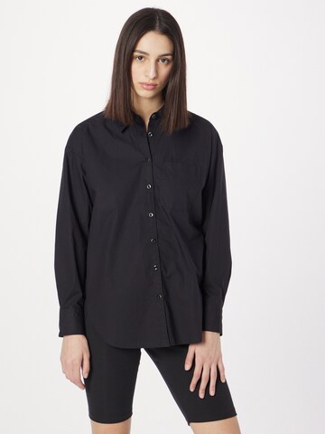 QS - Blusa em preto: frente