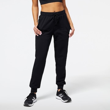 new balance Tapered Workout Pants in Black: front