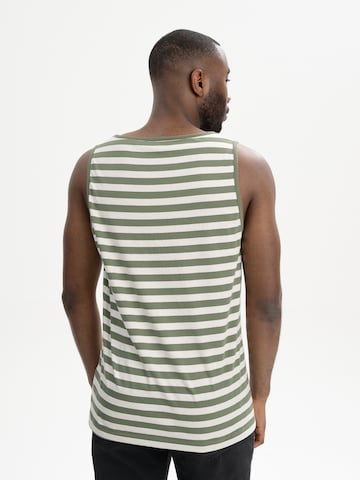 MELA T-shirt 'Chetan' i grön