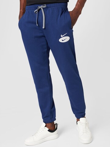 Effilé Pantalon Nike Sportswear en bleu : devant