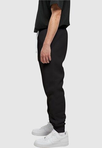 Loosefit Pantaloni de la SOUTHPOLE pe negru