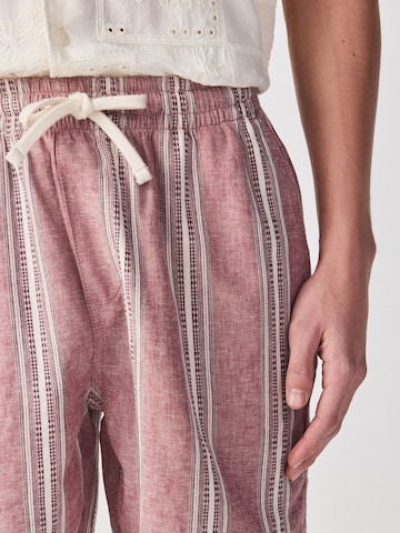 Largi Pantaloni de la Next pe roșu