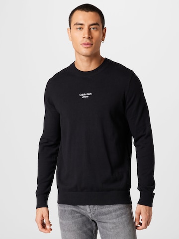 Pull-over Calvin Klein Jeans en noir : devant