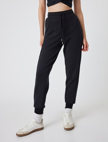 Koton Loosefit Broek in Grijs: voorkant