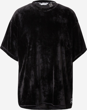 T-shirt fonctionnel DKNY Performance en noir : devant