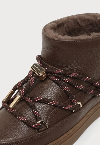 INUIKII Boots in Brown