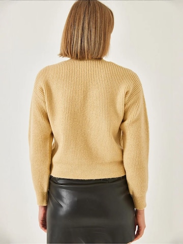 Cardigan Bianco Lucci en marron