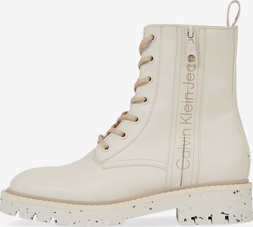Calvin Klein Lace-Up Ankle Boots in White: front