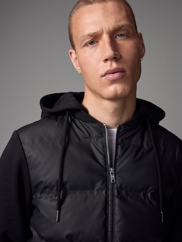 Next Övergångsjacka i svart