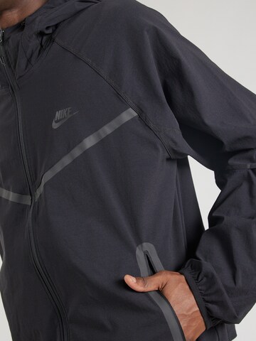 Nike Sportswear Between-season jacket 'Tech' in Black