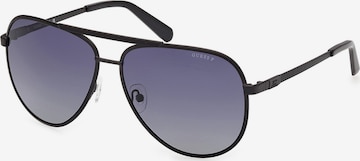 Lunettes de soleil GUESS en noir : devant