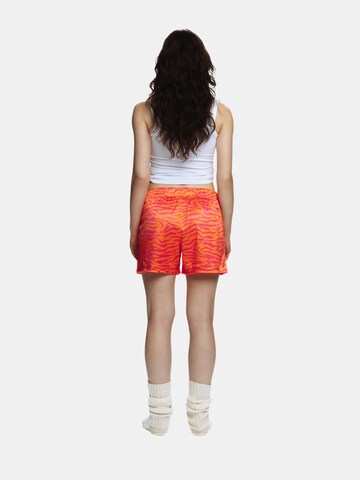 EKCENTRIK Loose fit Pants 'Wild Sunrise' in Red
