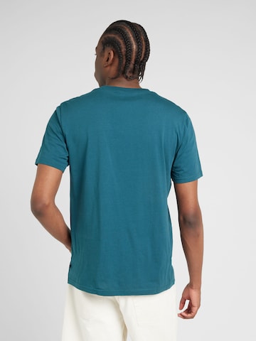 QS - Camiseta en verde