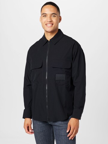 Calvin Klein Jeans Between-season jacket 'ESSENTIAL' in Black: front