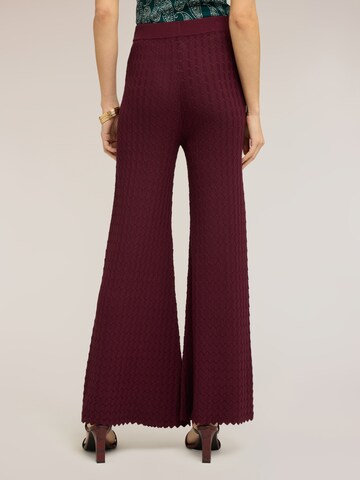 MOTIVI Flared Trousers in Red