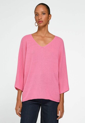 Pull-over include en rose : devant