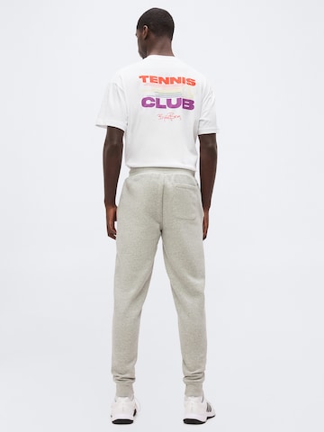 BJÖRN BORG - Tapered Calças de desporto 'ESSENTIAL 1' em cinzento