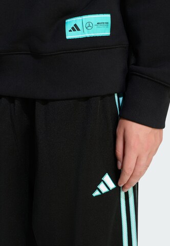 Loosefit Pantaloni sportivi 'Mercedes - Amg Petronas Formula One Team Las Vegas' di ADIDAS PERFORMANCE in nero